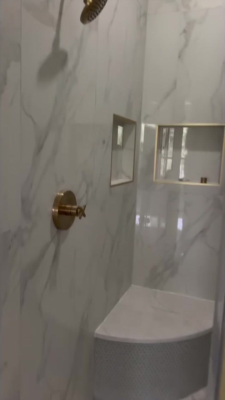Finished freestanding soaking tub beside the remodeled New Life walk-in shower