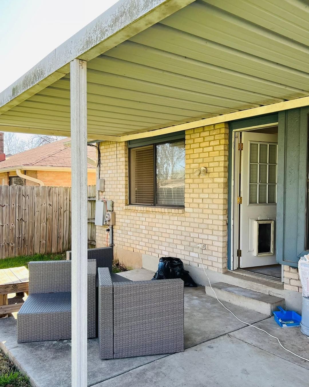 Covered patio exterior before painting and finish updates