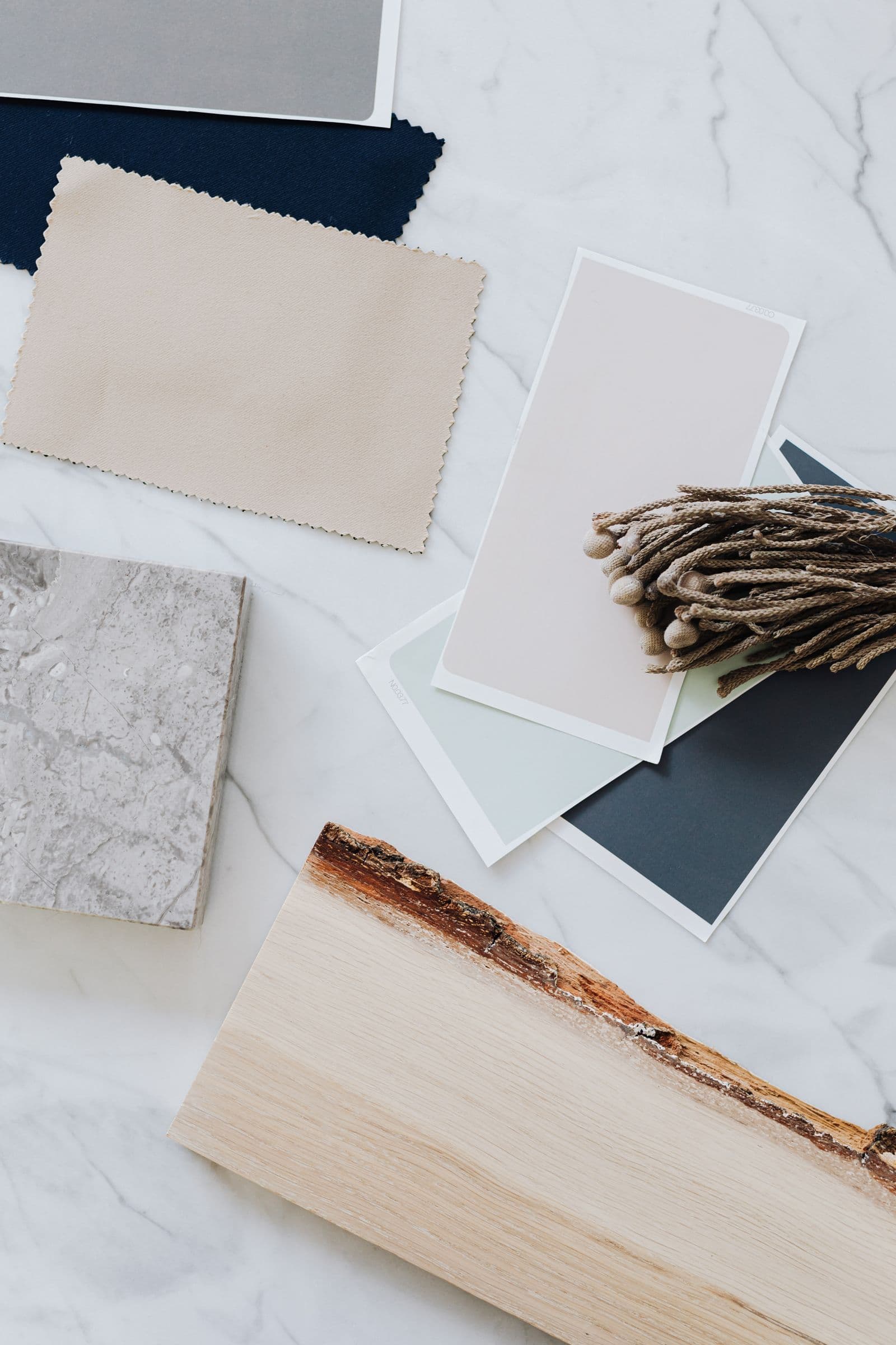 Flooring and interior finish samples arranged for a material selection conversation