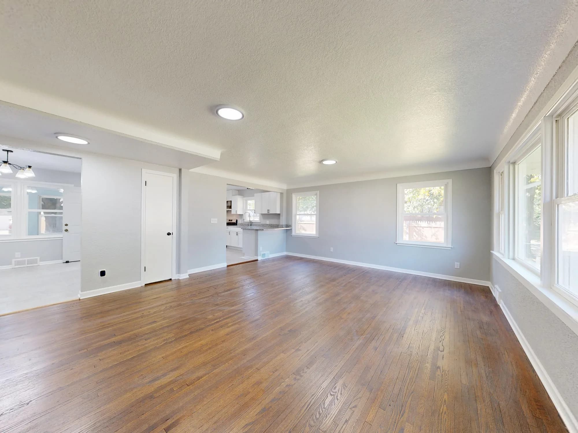 Hardwood flooring design inspiration in a bright open living room